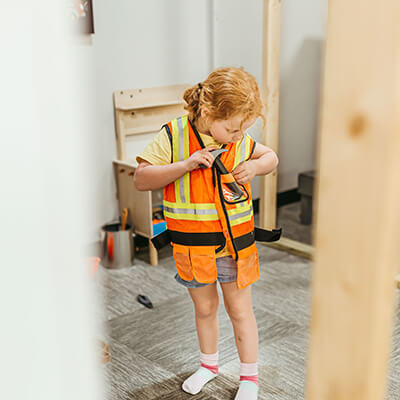 Girl wearing a safety vest